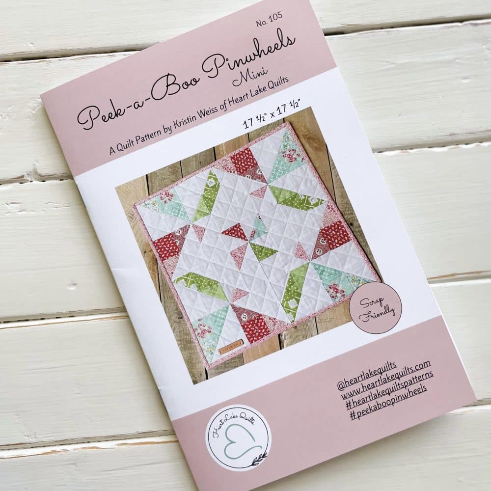 Heart Lake Quilts Peek-a-Boo Pinwheels Mini pattern, showcasing a colorful, small-scale quilt design by Kristin Weiss.