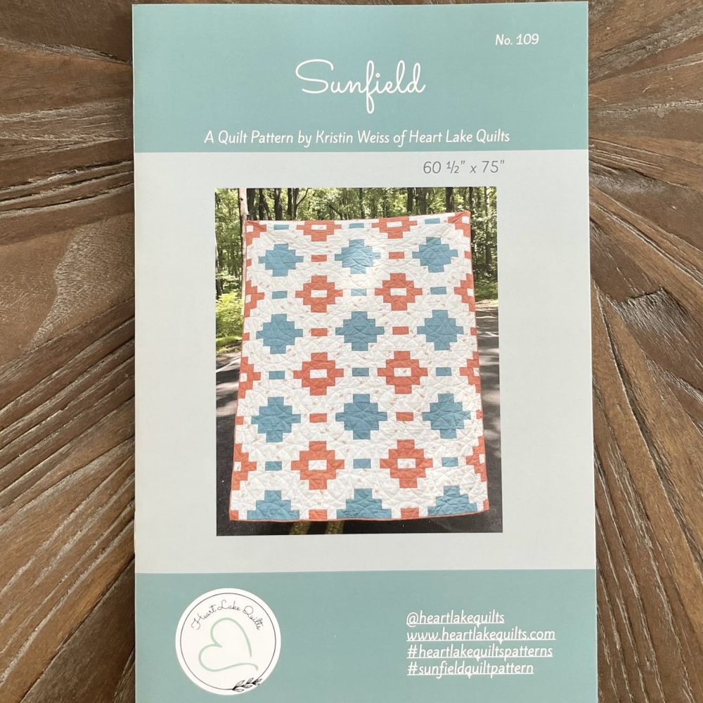 Sunfield quilt pattern by Heart Lake Quilts, featuring a colorful geometric design, 60 1/2 x 75, pattern number 109.